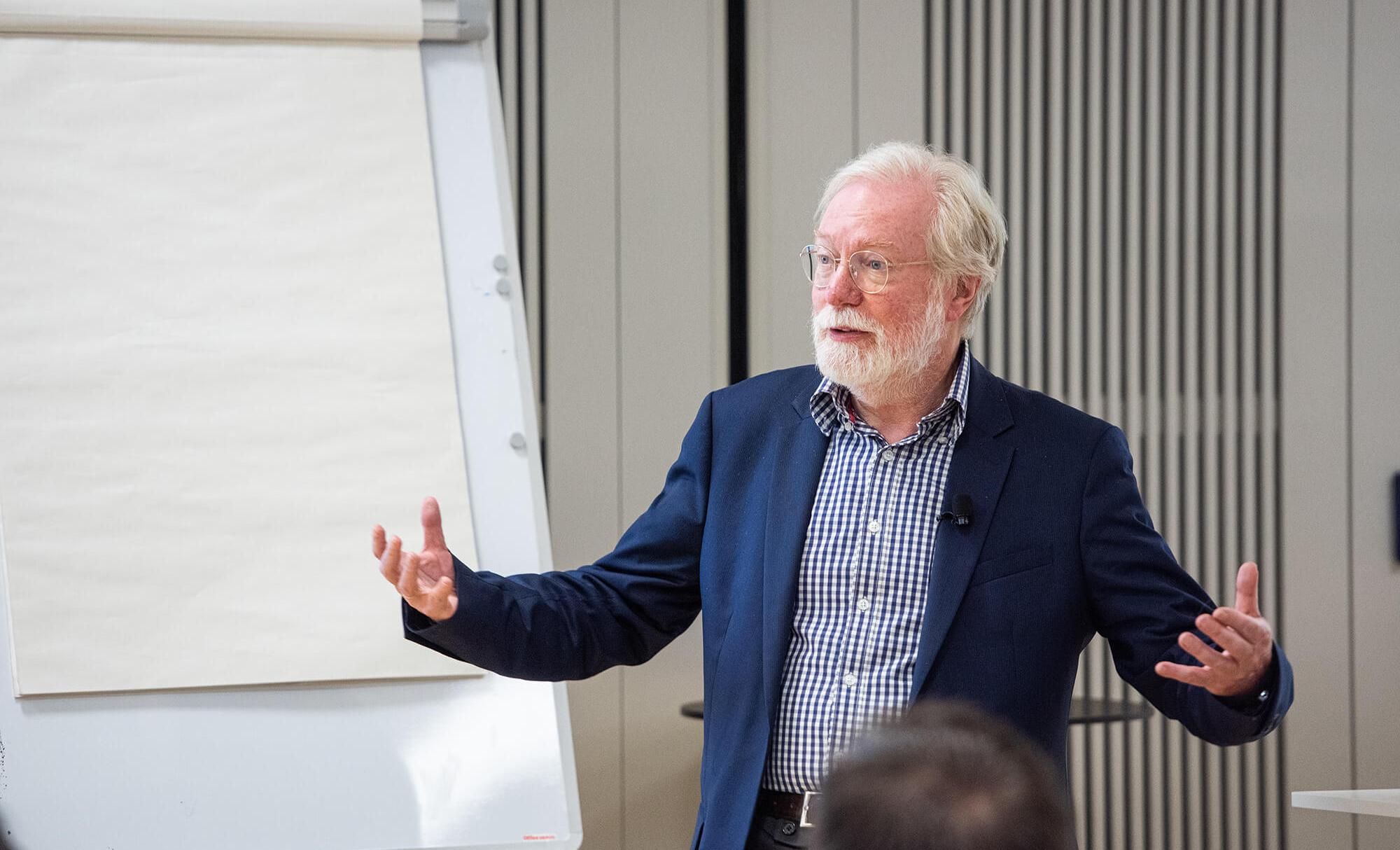 Professor Paul Collier addresses a class