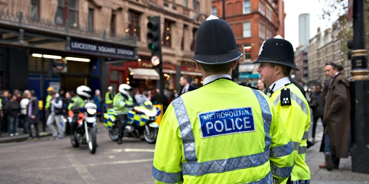 Metropolitan Police standing on the street in London