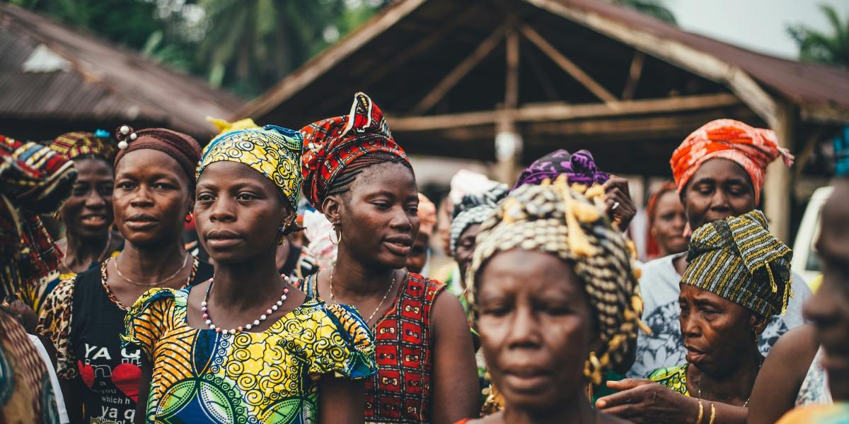 A group of women in colourful dresses in Sierra Leone