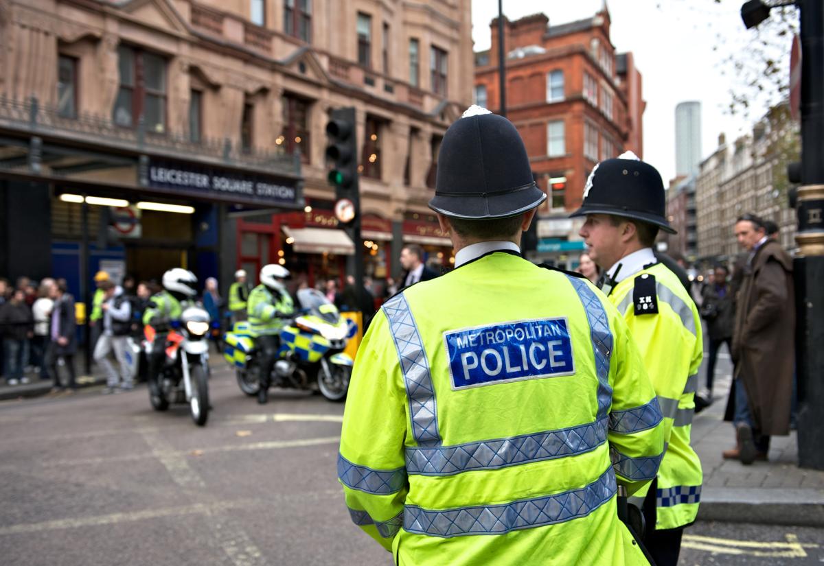 Metropolitan Police standing on the street in London