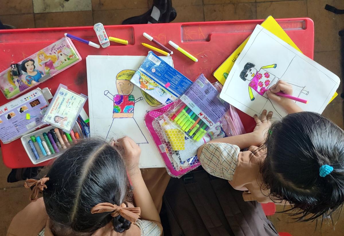 students painting